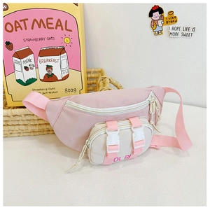 Detail of pink and beige nylon kids fanny pack with buckles and adjustable strap