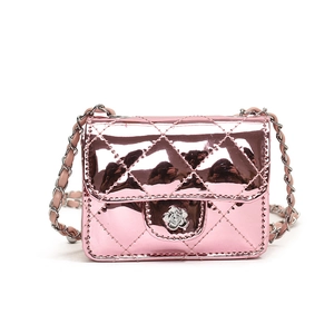 Pink metallic quilted crossbody bag with camellia lock and chain strap for children