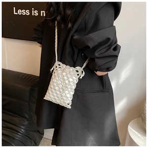Vertical pearl woven mini crossbody bag with satin lining and long chain strap