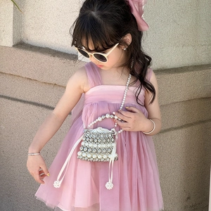 Kids pearl beaded crossbody bag with drawstring lining and elegant metal beads