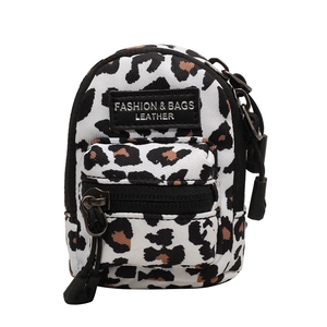 Mini leopard print crossbody bag for girls featuring high-quality canvas and silver metal hardware