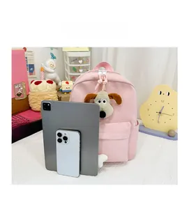 Pink backpack size comparison with tablet and phone showing large storage capacity