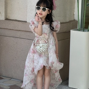 Floral print summer girl dress with puff sleeves and asymmetrical hem in off-white