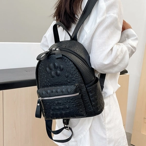 Minimalist black crocodile embossed leather backpack for women stylish travel daypack