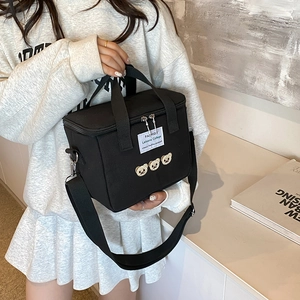 Black canvas diaper bag with cute bear embroidery and adjustable shoulder strap