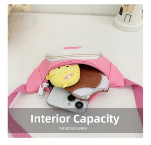 Detail view of pink and white kids' chest bag interior showing large capacity for essentials