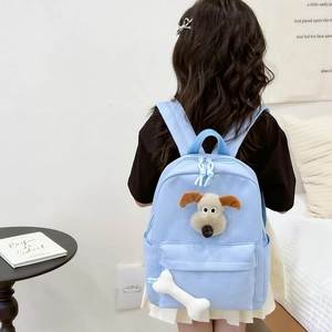 Cute light blue kids backpack with 3D plush puppy and bone charm for school