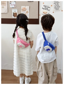Kids fashion chest bag with contrast colors and adjustable strap shown in daily wear