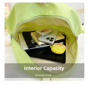Interior view of kids cartoon backpack showing large capacity for books and tablet
