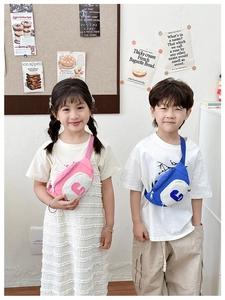 Detail of colorful kids chest bags with letter G embroidery and adjustable straps