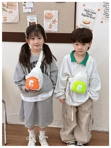 Kids trendy crossbody chest bags in orange and neon green with white letter G print