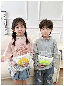 Detail of color-block kids chest bags featuring letter C patch and matte leather texture