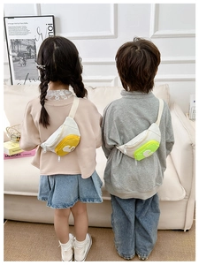 Kids color-block canvas chest bags with 3D G letter and adjustable straps shown on models