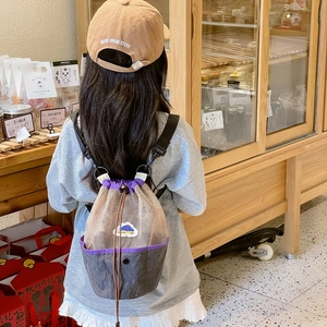 Kids purple mesh drawstring backpack and beige baseball cap set for outdoor beach travel