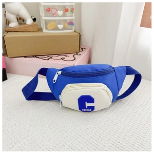 Detail of blue and white contrast crossbody bag for kids with letter C patch and zipper