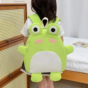 Cute green 3D frog cartoon backpack for kids featuring vibrant contrast colors and soft straps