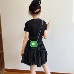 Kids cute green heart-shaped crossbody bag with chain strap and gold buckle detail