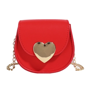 Kids heart crossbody bag in red faux leather with gold chain and large heart buckle