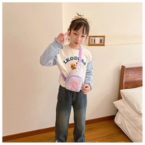Detail view of mini purple canvas chest bag for kids with cute mermaid cartoon design