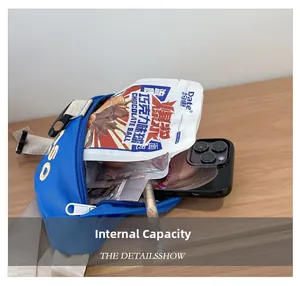 Internal capacity of the blue kids canvas waist bag showing storage for phone and snacks