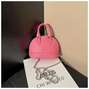 Pink shell shaped mini bag detail with silver chain and FASHION & BAGS lettering