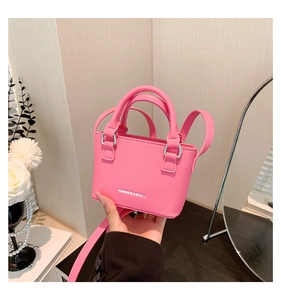 Pink mini handbag with lychee pattern leather and fashion text detail