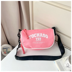 Detail of pink half-moon crossbody bag with letter print and black chain strap
