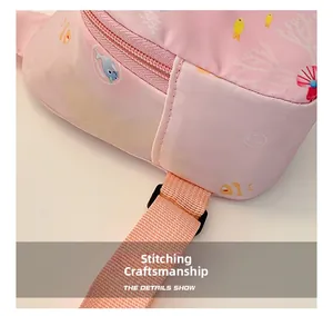 Close-up of pink canvas kid bag showing smooth zipper and detailed stitching crafts
