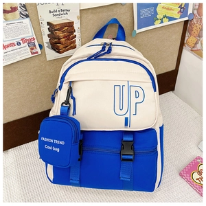 Detail of canvas backpack with blue UP print, side coin purse, and adjustable buckle straps