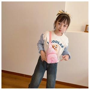 Detailed view of pink canvas chest bag with cartoon mermaid print for toddlers