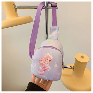 Detail of purple canvas toddler chest bag featuring mermaid print and adjustable strap