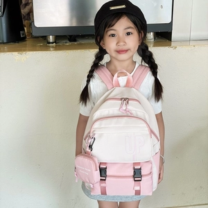 Pink and beige large capacity kids backpack with small round charm bag for school