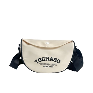 Sac bandoulière minimaliste en toile crème avec imprimé lettres noires pour enfants mode