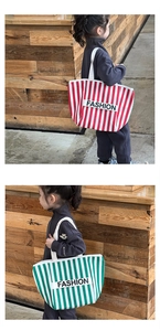 Detail of red and green striped canvas kids crossbody bags with fashion letter patch