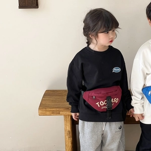 Kids streetwear set with black sweatshirt, grey joggers and burgundy canvas waist bag