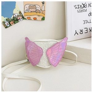Close-up of white children's butterfly bag with pink iridescent sequins and fine stitching