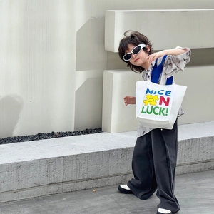 Sac bandoulière enfant en toile blanche avec sangle bleue et motif coloré Nice Luck