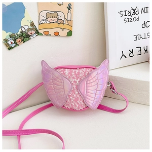 Close-up of pink sequined kid handbag with iridescent laser angel wings detail