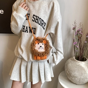 Sac bandoulière lion au crochet pour enfants avec tricot orange et détails de crinière