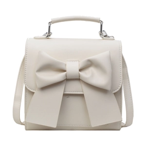 Creamy white mini backpack for women featuring a large bow and top handle