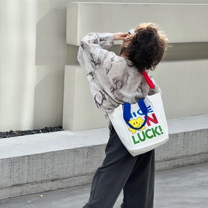 Sac fourre-tout en toile pour enfants avec anses bleues et bandoulière rouge