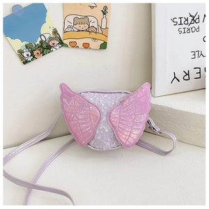 Close-up of children's purple sequin crossbody bag with laser-style butterfly wings