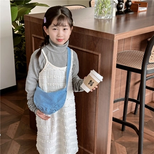 Kids minimalist blue denim dumpling crossbody bag styled with autumn outfit