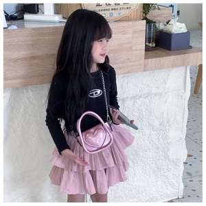 Pink sequin heart-shaped crossbody bag with silver chain strap for young girls