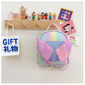 Detail of pink pearl handle and sequin gradient finish on girls wing backpack