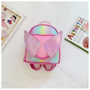 Detailed top view of a sparkly rainbow sequin girls backpack with pink pearl handle