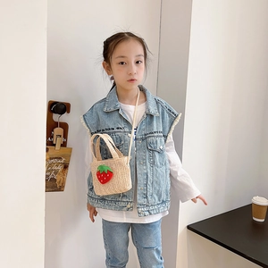 Handmade straw crossbody bag for kids featuring a 3D strawberry applique with dual handles