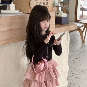 Kids black top and pink tiered skirt set with a heart-shaped sequin crossbody bag