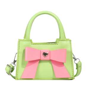 Borsa a tracolla per bambini con fiocco rosa e fibbia a cuore in contrasto verde e rosa