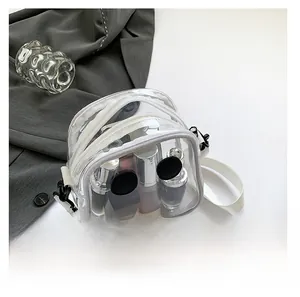 Detail showing internal storage capacity of the transparent PVC crossbody jelly bag